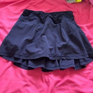 Dark purple rare color lululemon skirt with shorts